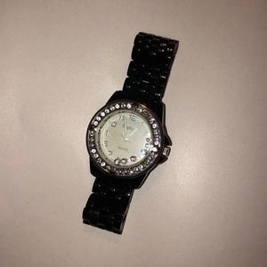 woman’s black quartz watch